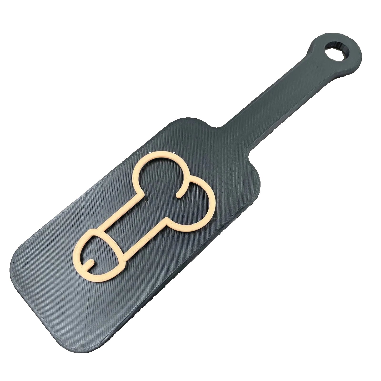Een kleine BDSM paddle met de afbeelding van een penis