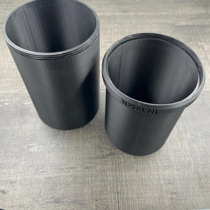 Een zwarte beschermkap voor een BDSM deegroller van 3DSM