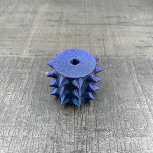 Een los rollertje voor een BDSM pinwheel in paars/blauw met glitter