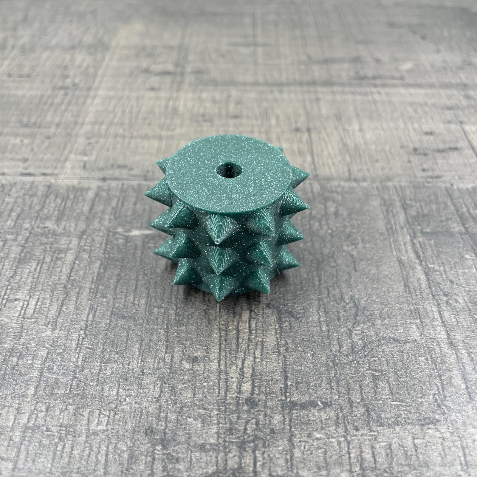 Een los rollertje voor een BDSM pinwheel in groen met glitters