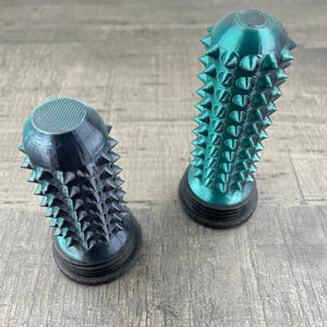 Een zwart met groene stimming-tool voor autisme en overprikkeling