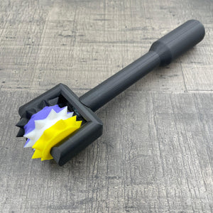 Een BDSM pinwheel met een zwart handvat